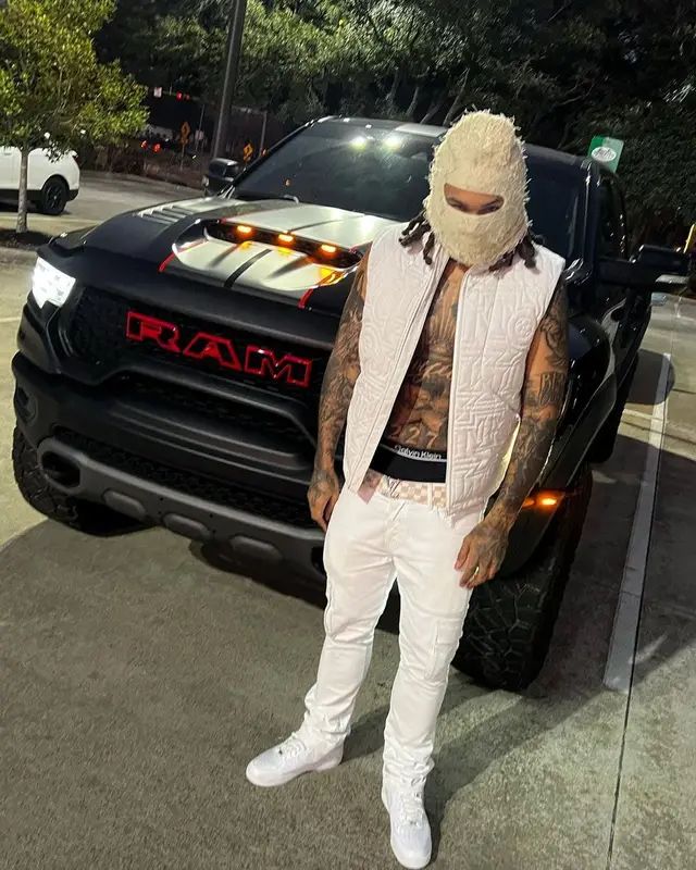 Money Man outfit in Louis Vuitton, Nike, and Calvin Klein, 2023
