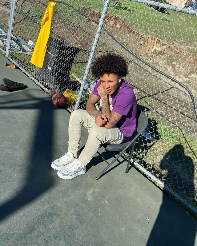 Mikey outfit in Palm Angels, Purple Brand, and Louis Vuitton, 2023