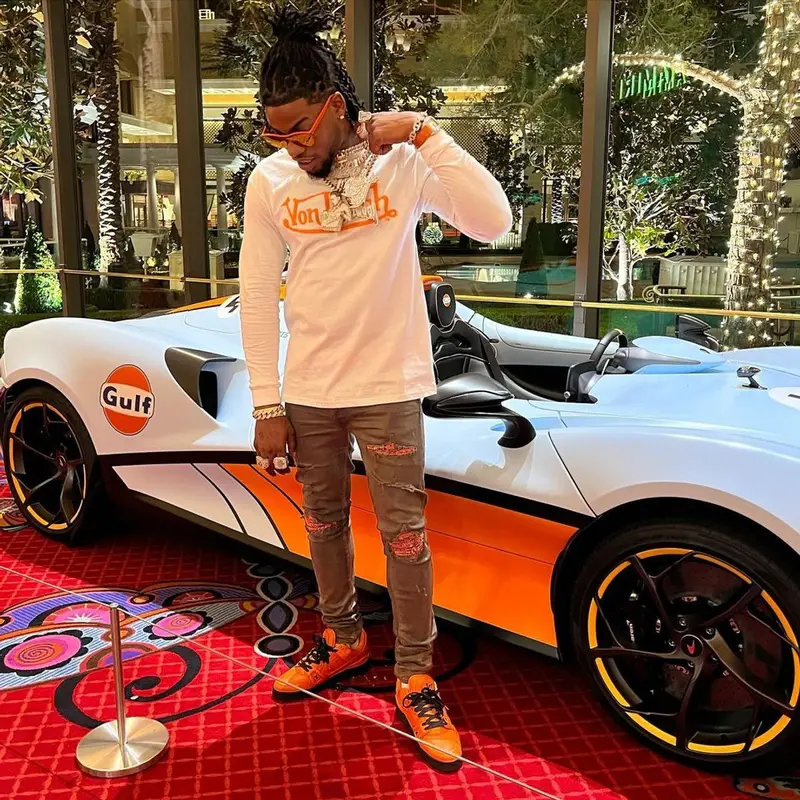 CJ So Cool outfit in Amiri and Louis Vuitton, 2023