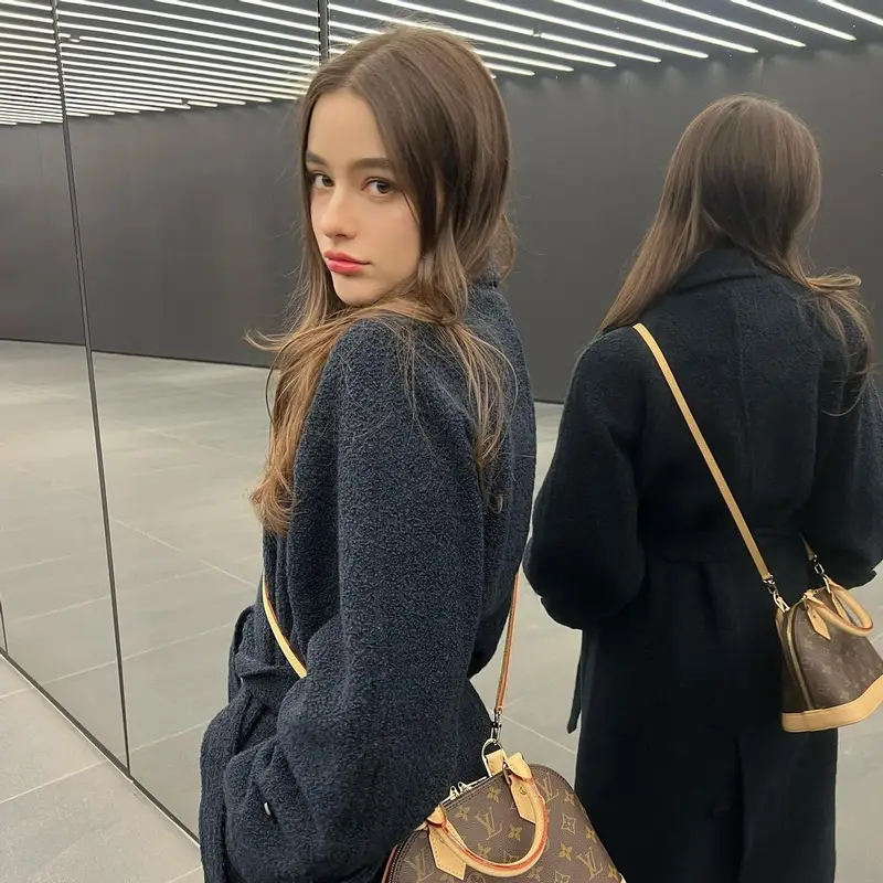 Dasha Taran outfit in Instantfunk and Louis Vuitton, 2022