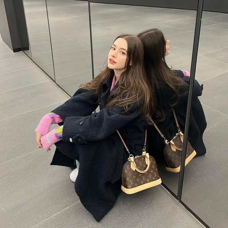 Dasha Taran outfit in Instantfunk and Louis Vuitton, 2022