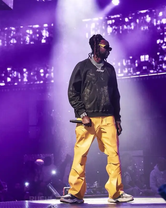 2 Chainz outfit in Samuel Zelig, Gucci, and Prada, 2023