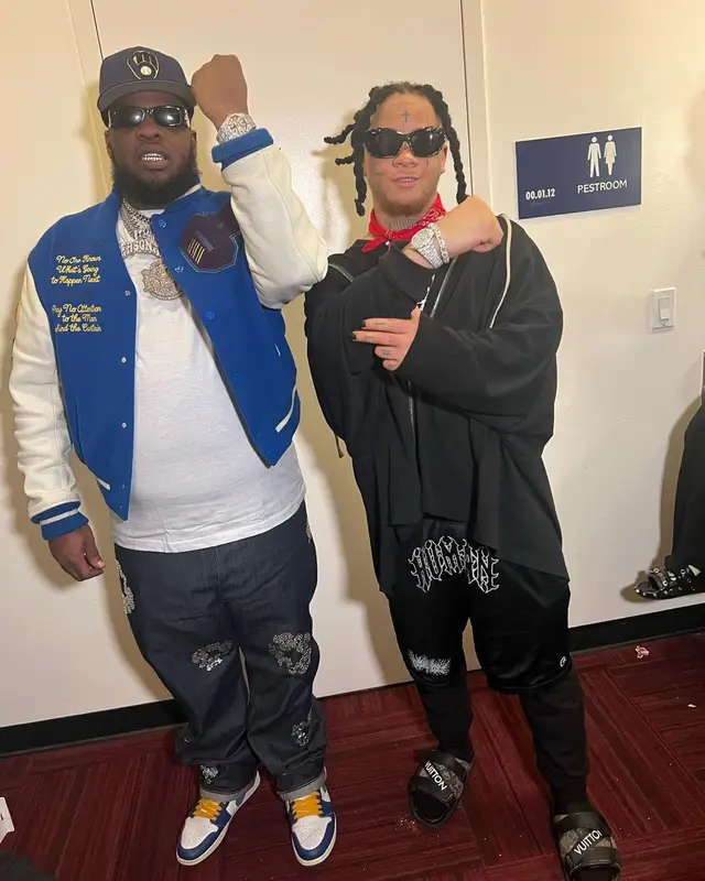 Maxo Kream outfit in Louis Vuitton, Balenciaga, and New Era, 2023