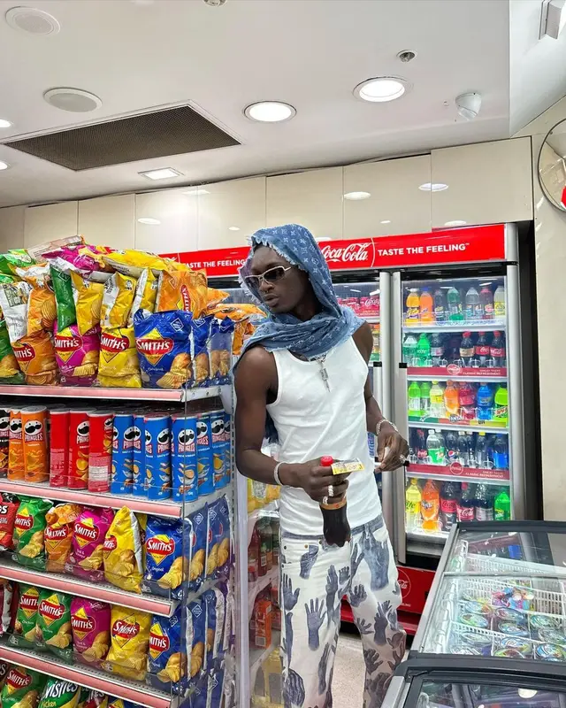 Jnr Choi outfit in Denim Tears, Ray-Ban, and Louis Vuitton, 2023