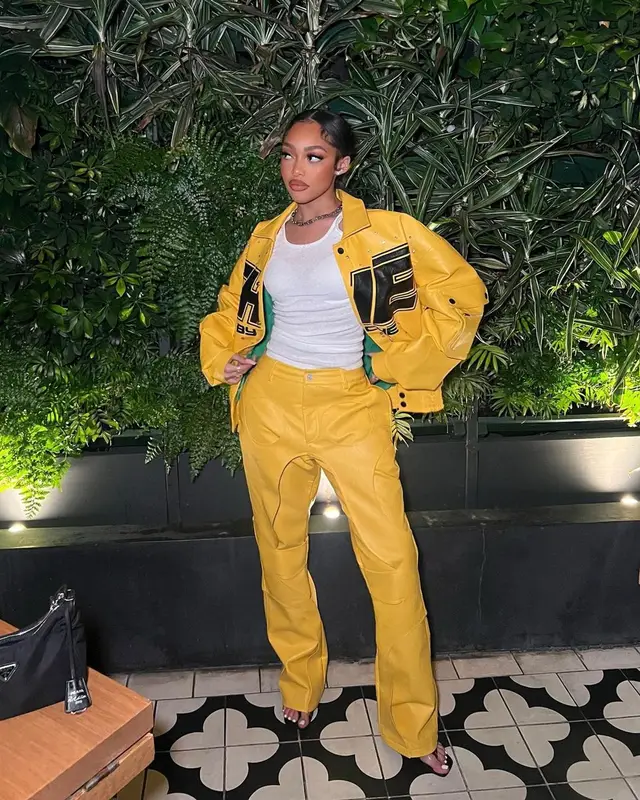 Jodie Woods outfit in Che By Che and Prada, 2023