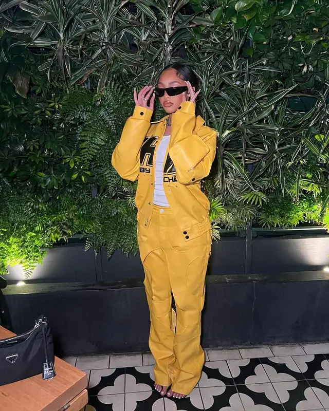 Jodie Woods outfit in Che By Che and Prada, 2023