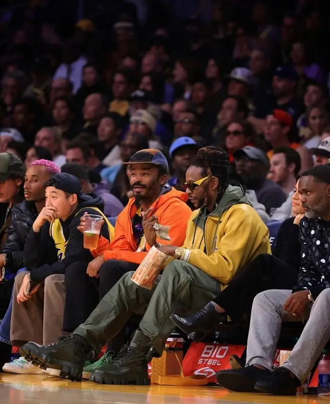 2 Chainz outfit in Avirex and Prada, 2023