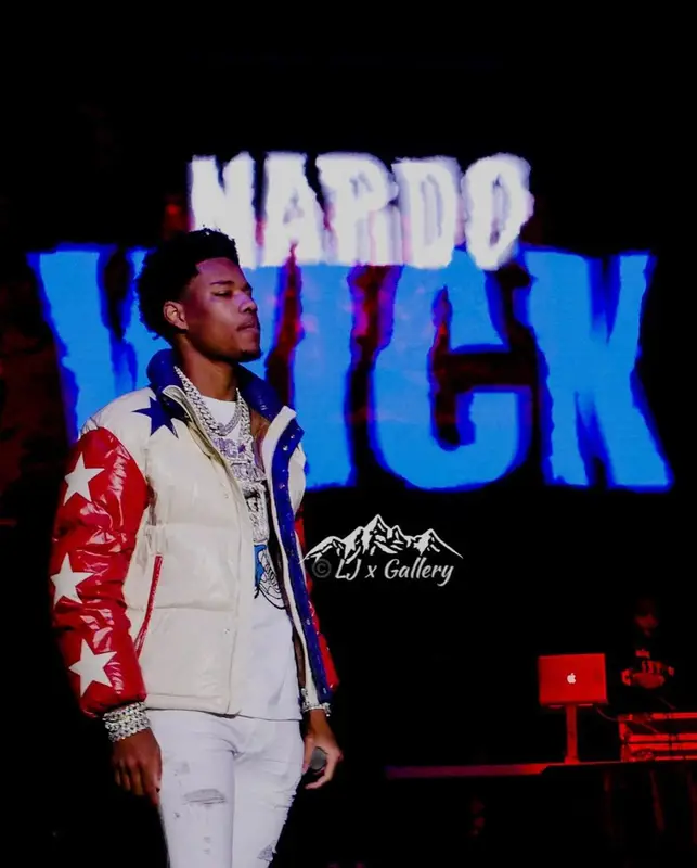 Nardo Wick outfit in Moncler, Supreme, and New Era, 2023