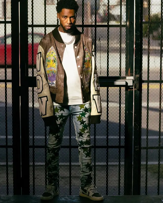 Key Glock outfit in Who Decides War, Amiri, and Chemist, 2023