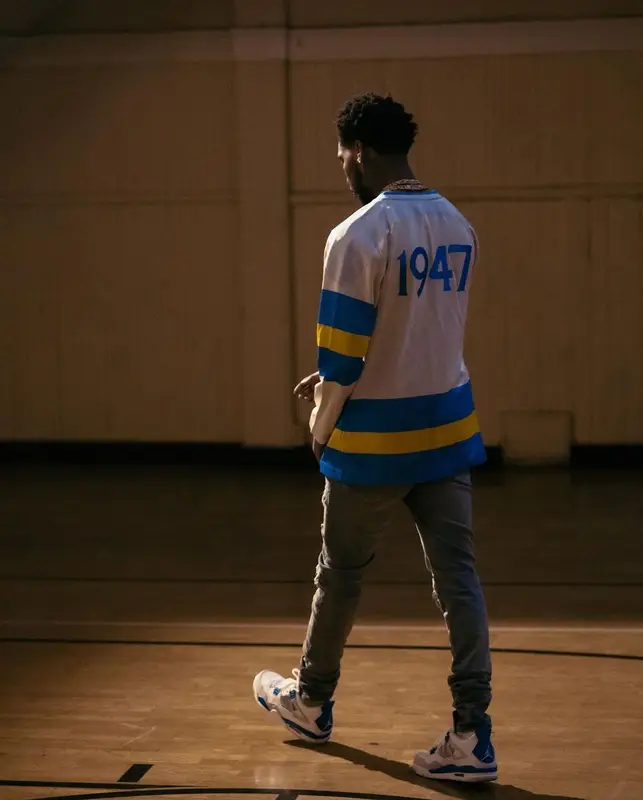 Key Glock outfit in Dior, Amiri, and Jordan, 2023