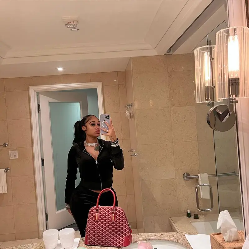 Jania Meshell outfit in Juicy Couture, New Balance, and Goyard, 2023