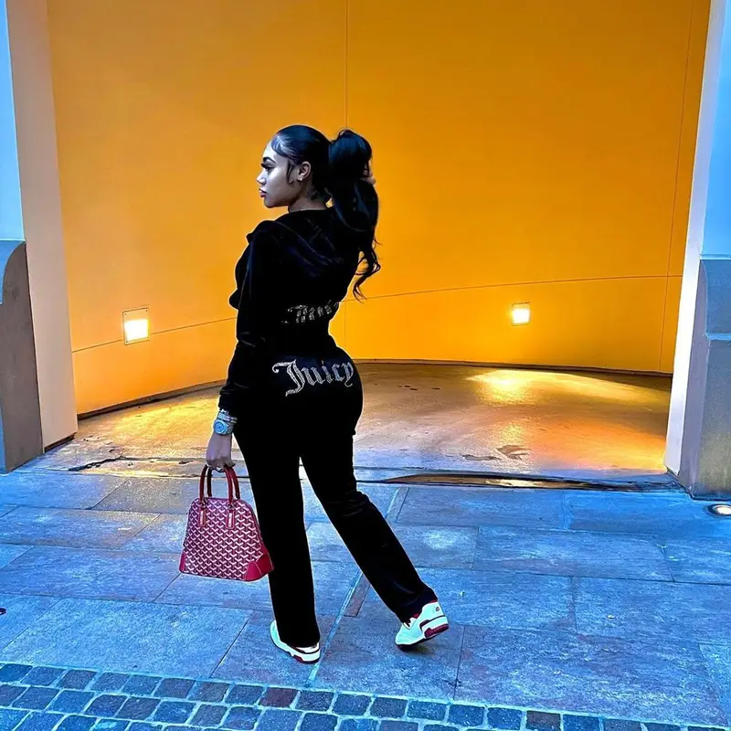 Jania Meshell outfit in Juicy Couture, New Balance, and Goyard, 2023