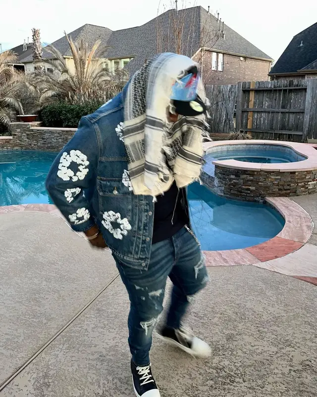 Peezy outfit in Levi’s, Amiri, and Denim Tears, 2023