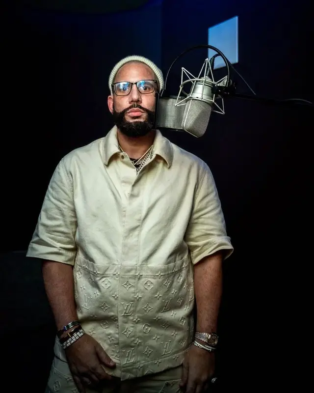 DJ Drama outfit in Louis Vuitton, Dior, and Tom Ford, 2023