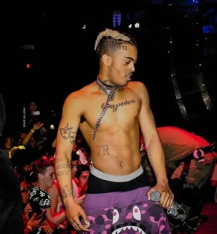 XXXTentacion outfit in Bape, XXXTentacion Merch, and Calvin Klein, 2018