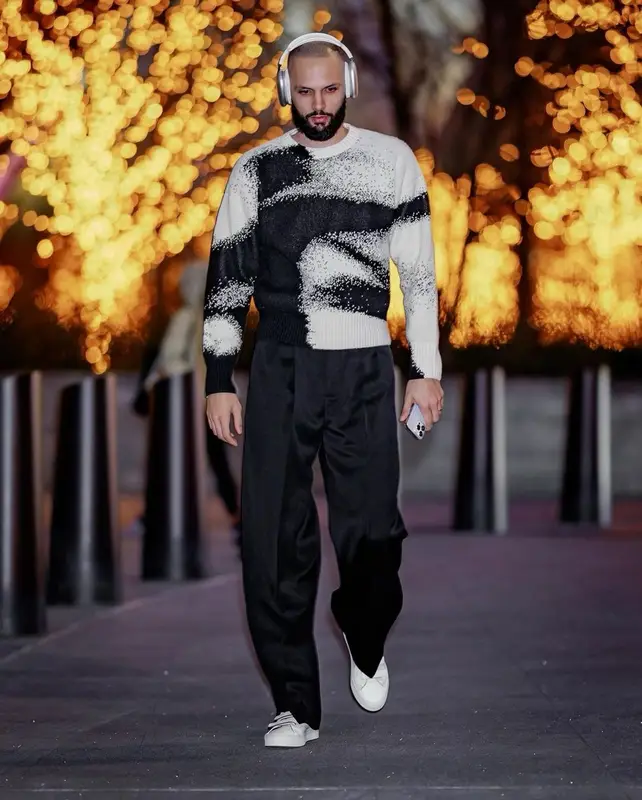 Evan Mehdi Fournier outfit in Alexander McQueen, Bottega Veneta, and Apple, 2023