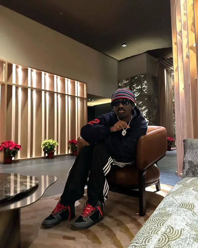Bruce Ray outfit in Balenciaga, Adidas, and Nike, 2022