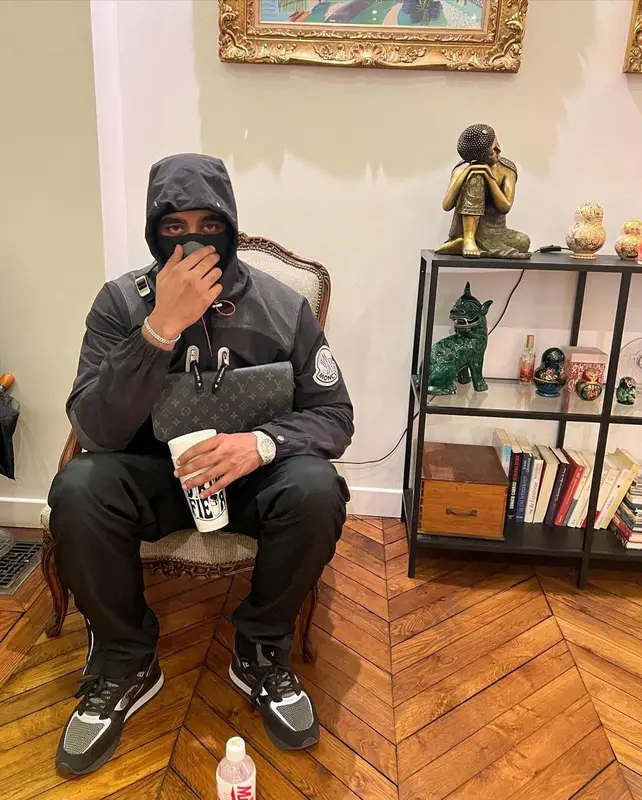 Ashe 22 outfit in Moncler, Louis Vuitton, and And Wander, 2022