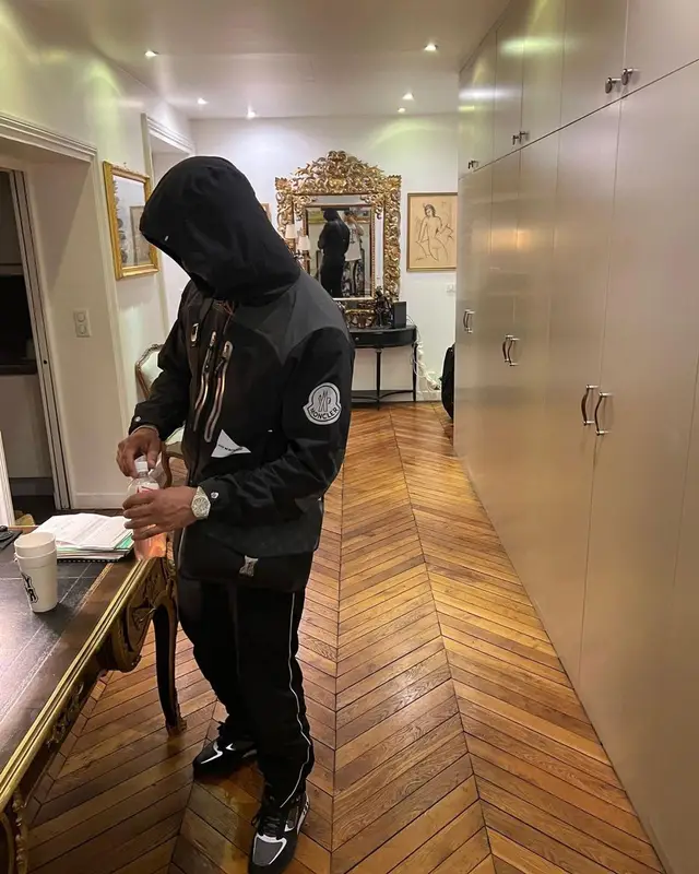 Ashe 22 outfit in Moncler, Louis Vuitton, and And Wander, 2022
