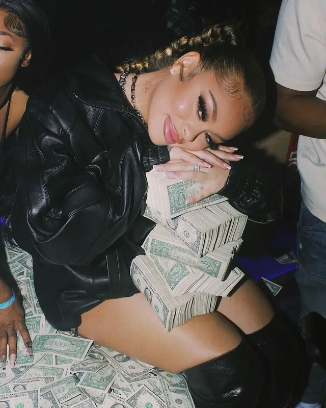Latto outfit in Alexander Wang, Moncler, and Gentle Monster, 2023