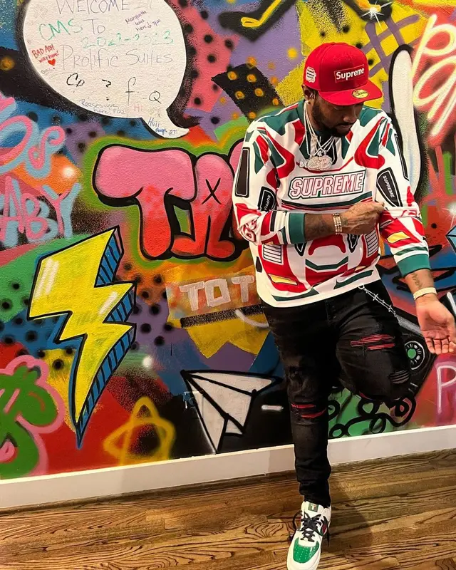 Peezy outfit in Amiri, Supreme, and New Era, 2023