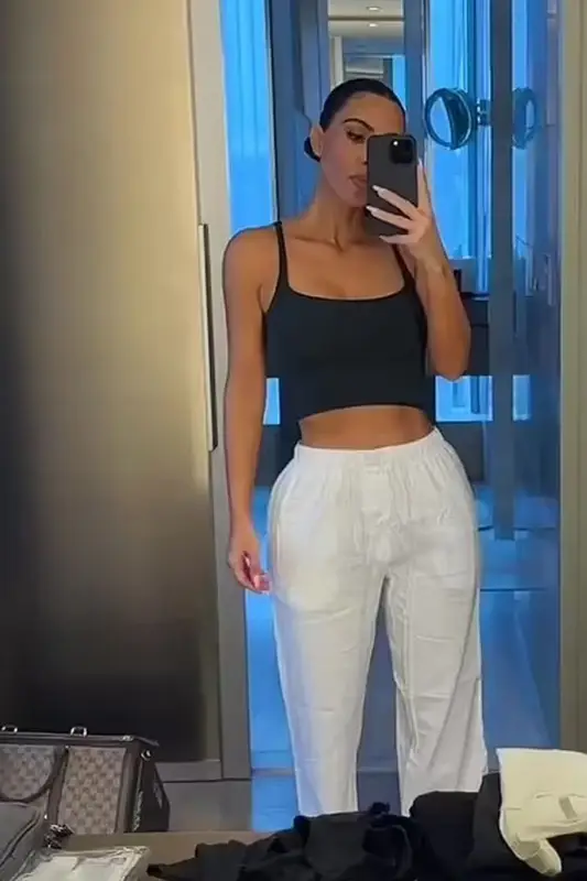 Kim Kardashian outfit in Skims, Gucci, and Palace, 2023