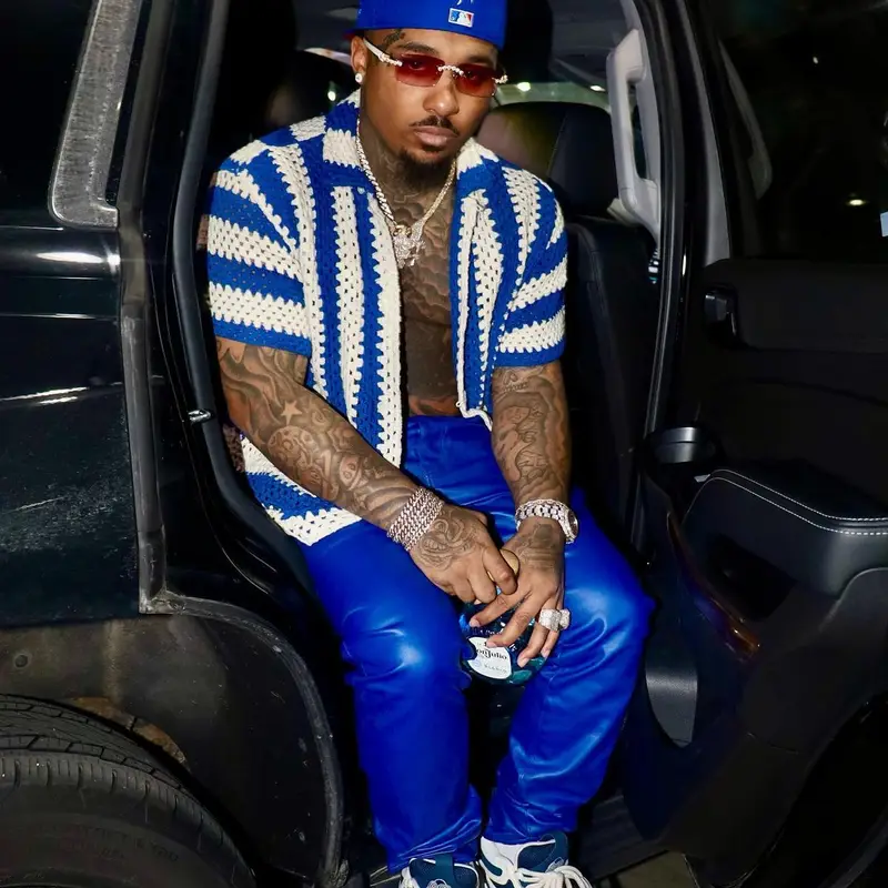 Doe Boy outfit in Bode, Purple Brand, and Louis Vuitton, 2023