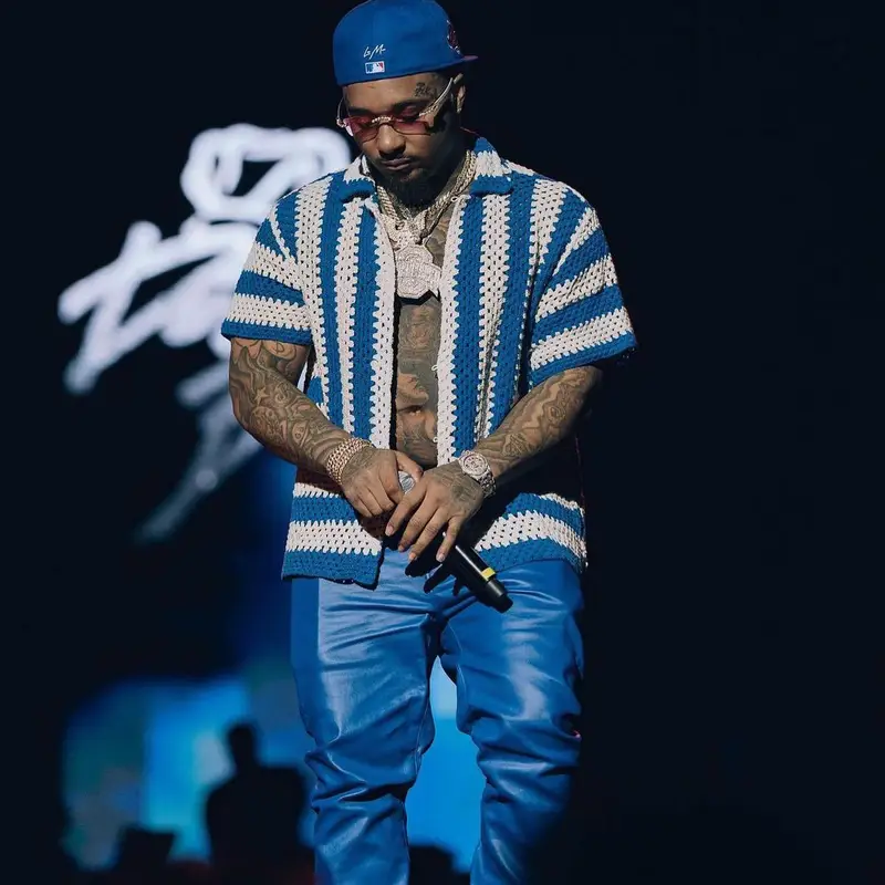 Doe Boy outfit in Bode, Purple Brand, and Louis Vuitton, 2023