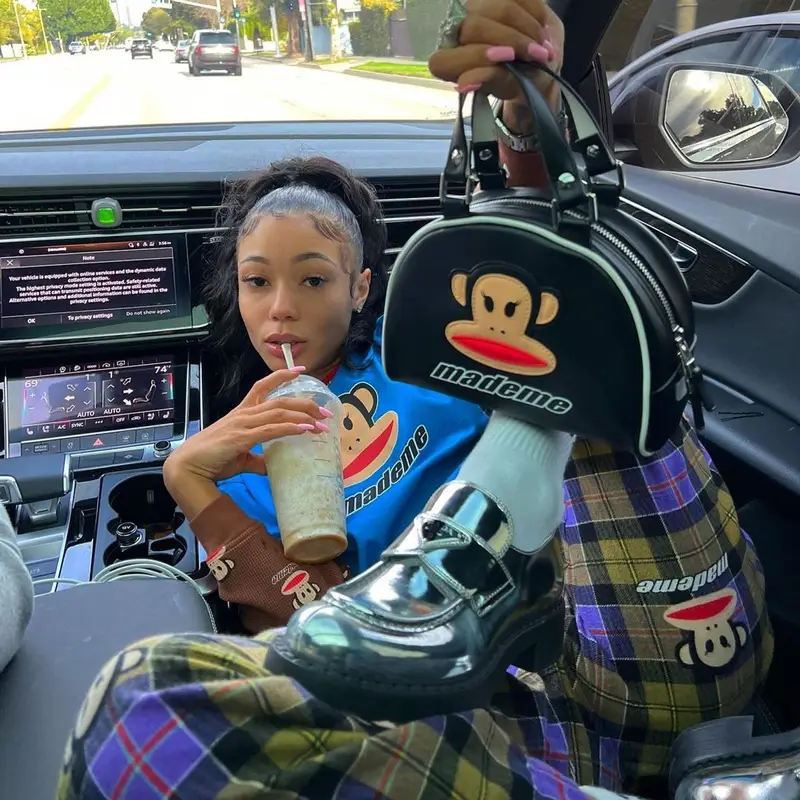Coi Leray outfit in Mademe, Prada, and Paul Frank, 2023