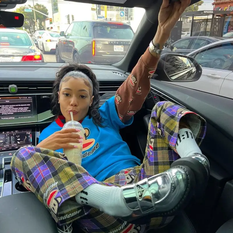 Coi Leray outfit in Mademe, Prada, and Paul Frank, 2023