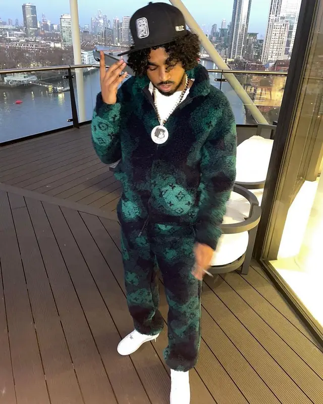 Mowgs outfit in Louis Vuitton and Nike, 2023