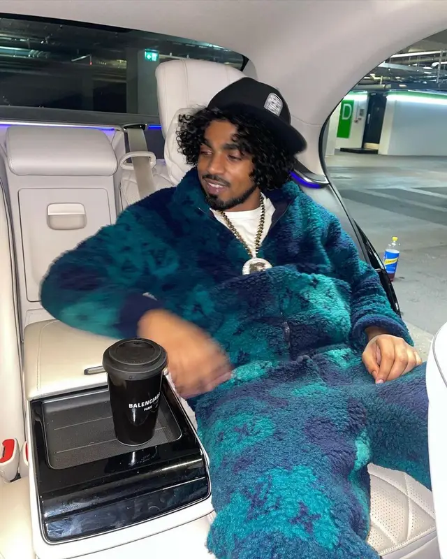 Mowgs outfit in Louis Vuitton and Nike, 2023
