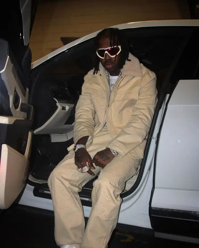 EST Gee outfit in Louis Vuitton, Nike, and Moncler, 2023