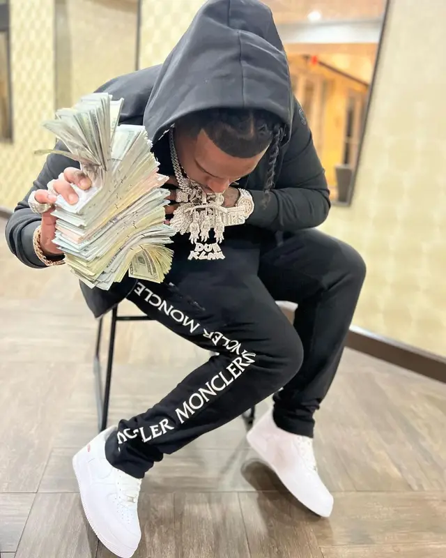 Finesse2tymes outfit in Moncler, Nike, and Supreme, 2023