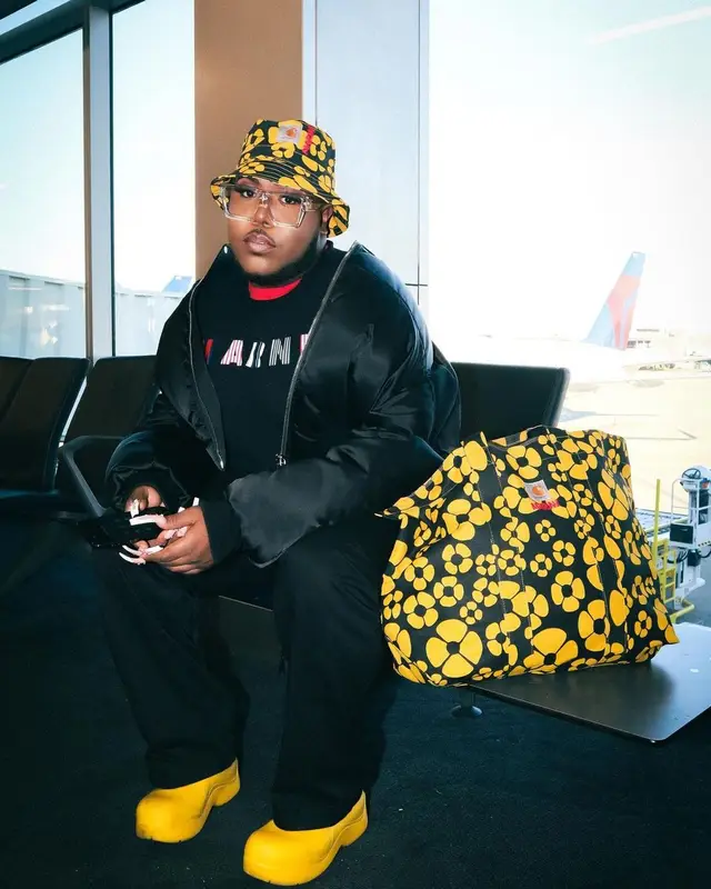 Saucy Santana outfit in Louis Vuitton, Carhartt, and Marni, 2023
