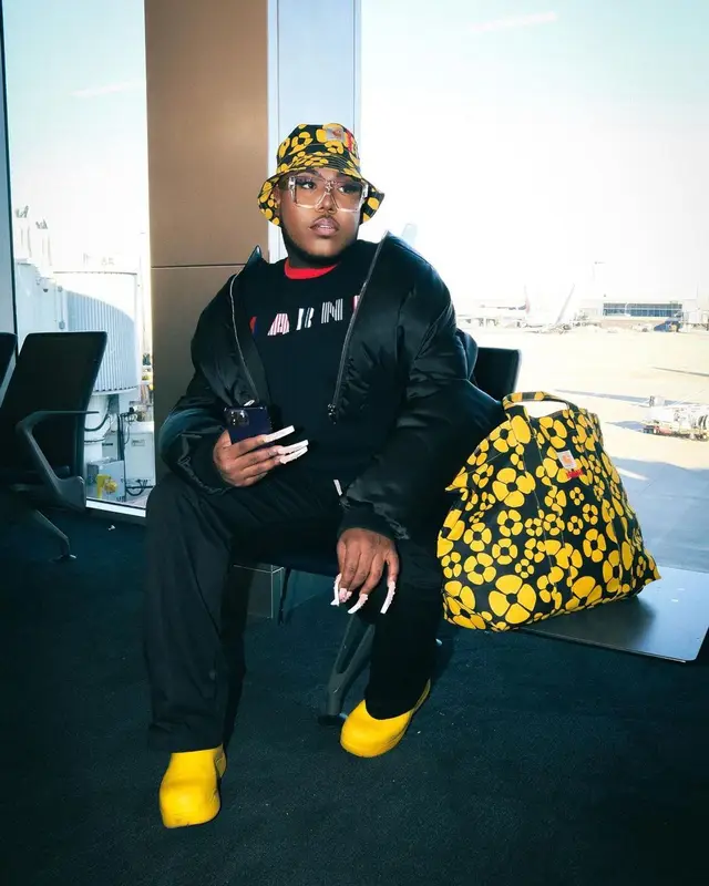 Saucy Santana outfit in Louis Vuitton, Carhartt, and Marni, 2023