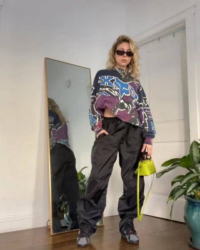 Lil Debbie outfit in Fox Racing, Jordan, and Fendi, 2023