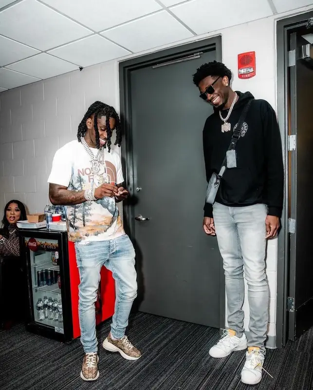 Polo G outfit in Gucci, Amiri, and The North Face, 2023