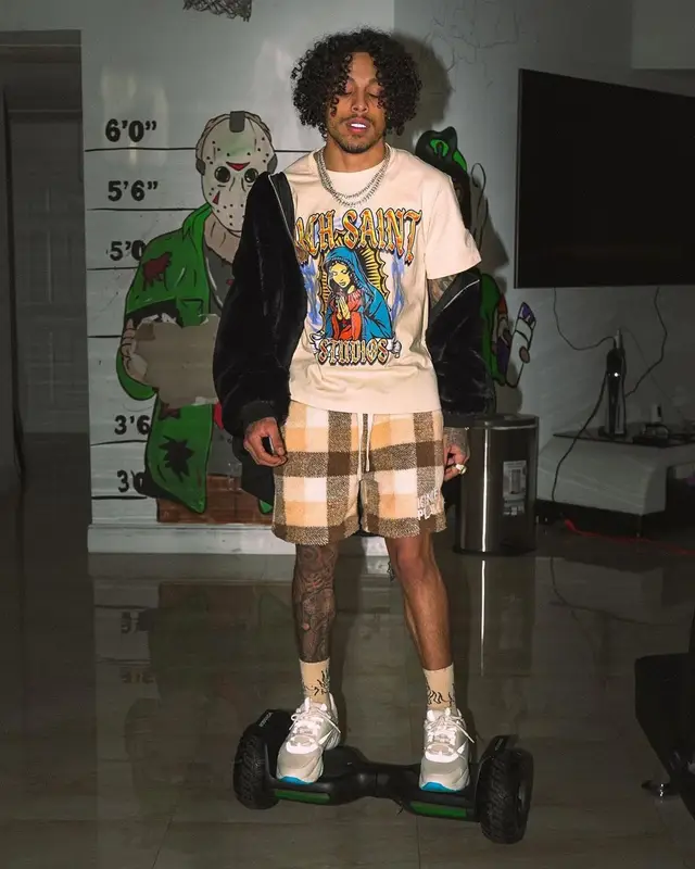 King Cid outfit in Rich Saints Studios, Kings Play, and Dior, 2023