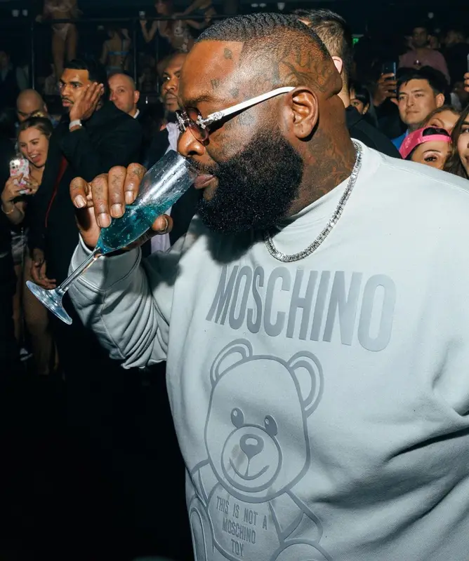 Rick Ross outfit in Moschino and Nike, 2023