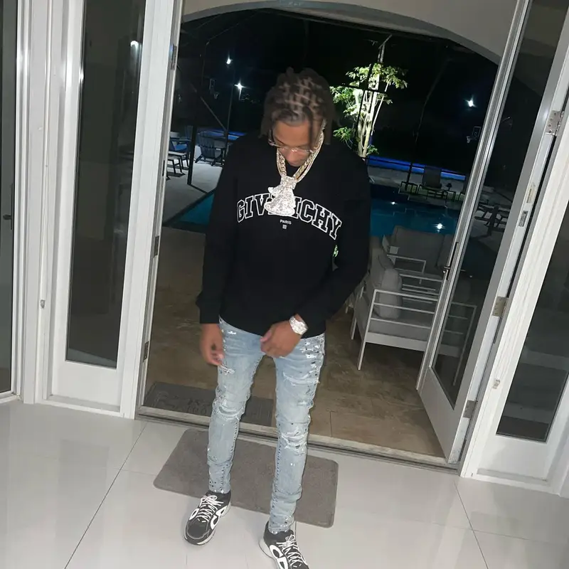 Skilla Baby outfit in Givenchy, Amiri, and Dior, 2023