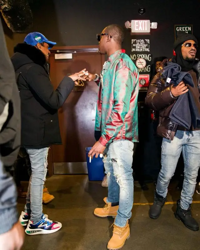 Bobby Shmurda outfit in Rta, Timberland, and Prada, 2023