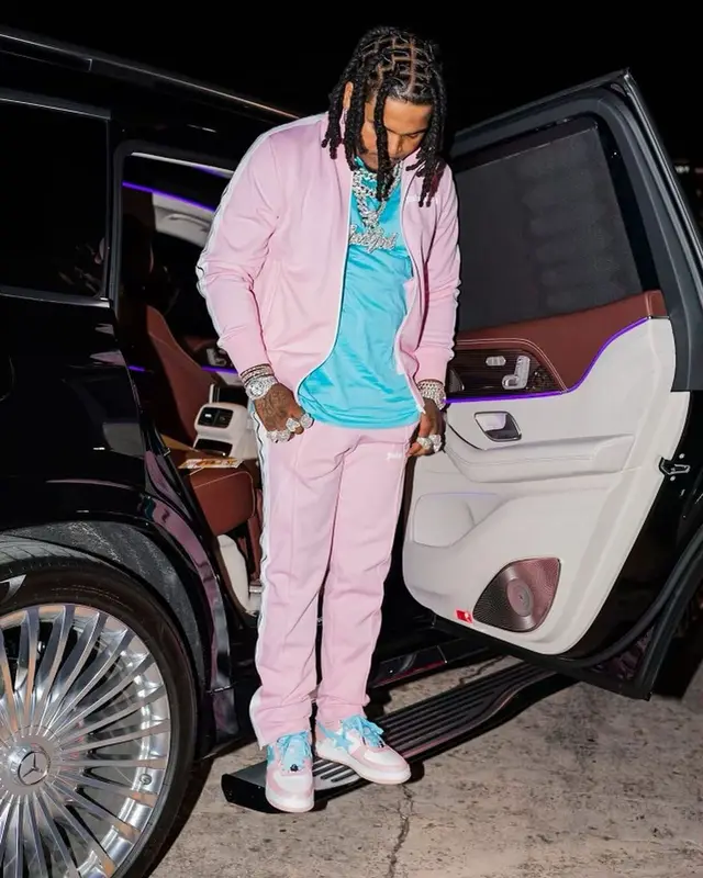 Lil Jairmy outfit in Palm Angels, Moncler, and Bape, 2022