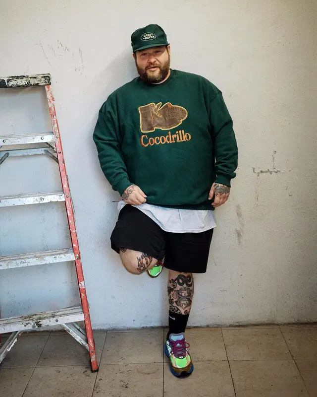 Action Bronson outfit in New Balance, Land Rover Merch, and Nike, 2022