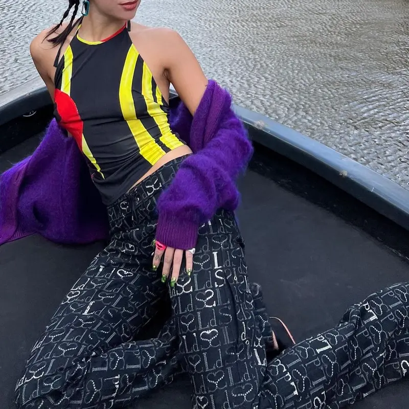 Dua Lipa outfit in Acne Studios, Ludovic de Saint Sernin, and Eera, 2022