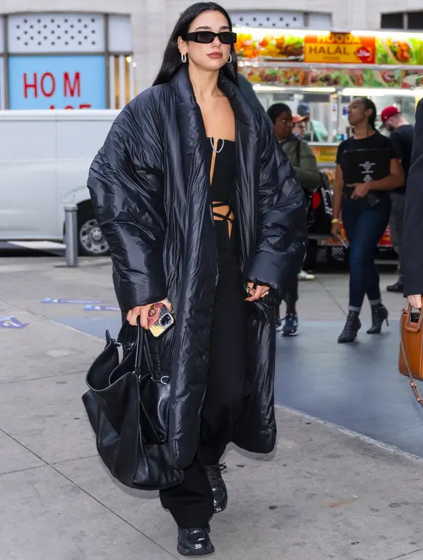 Dua Lipa outfit in Yeezy, GCDS, and GAP, 2022