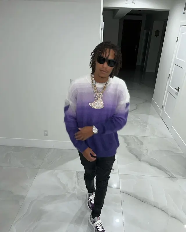 Skilla Baby outfit in Off-White, Amiri, and Prada, 2023