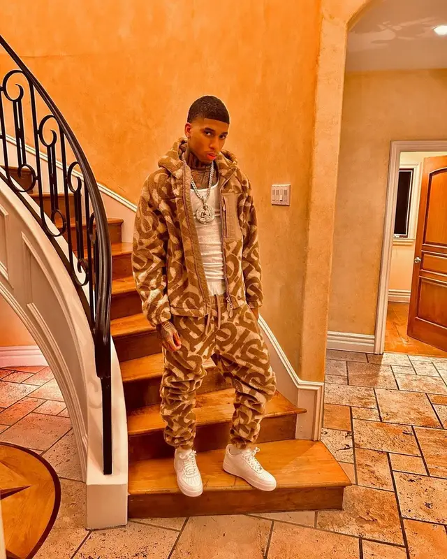 NLE Choppa outfit in Burberry and Nike, 2023