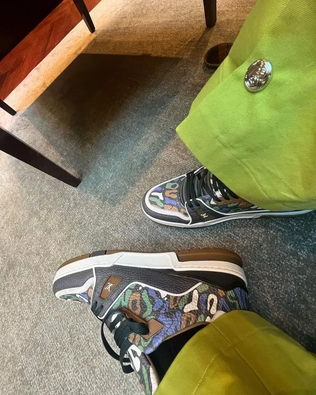 Polo G outfit in Bluemarble and Louis Vuitton, 2023