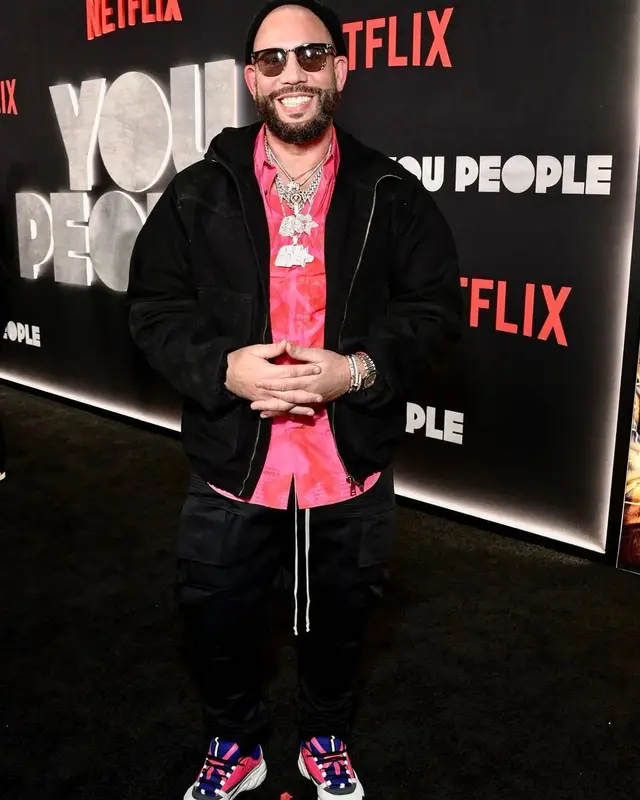 DJ Drama outfit in Louis Vuitton, Dior, and Tom Ford, 2023